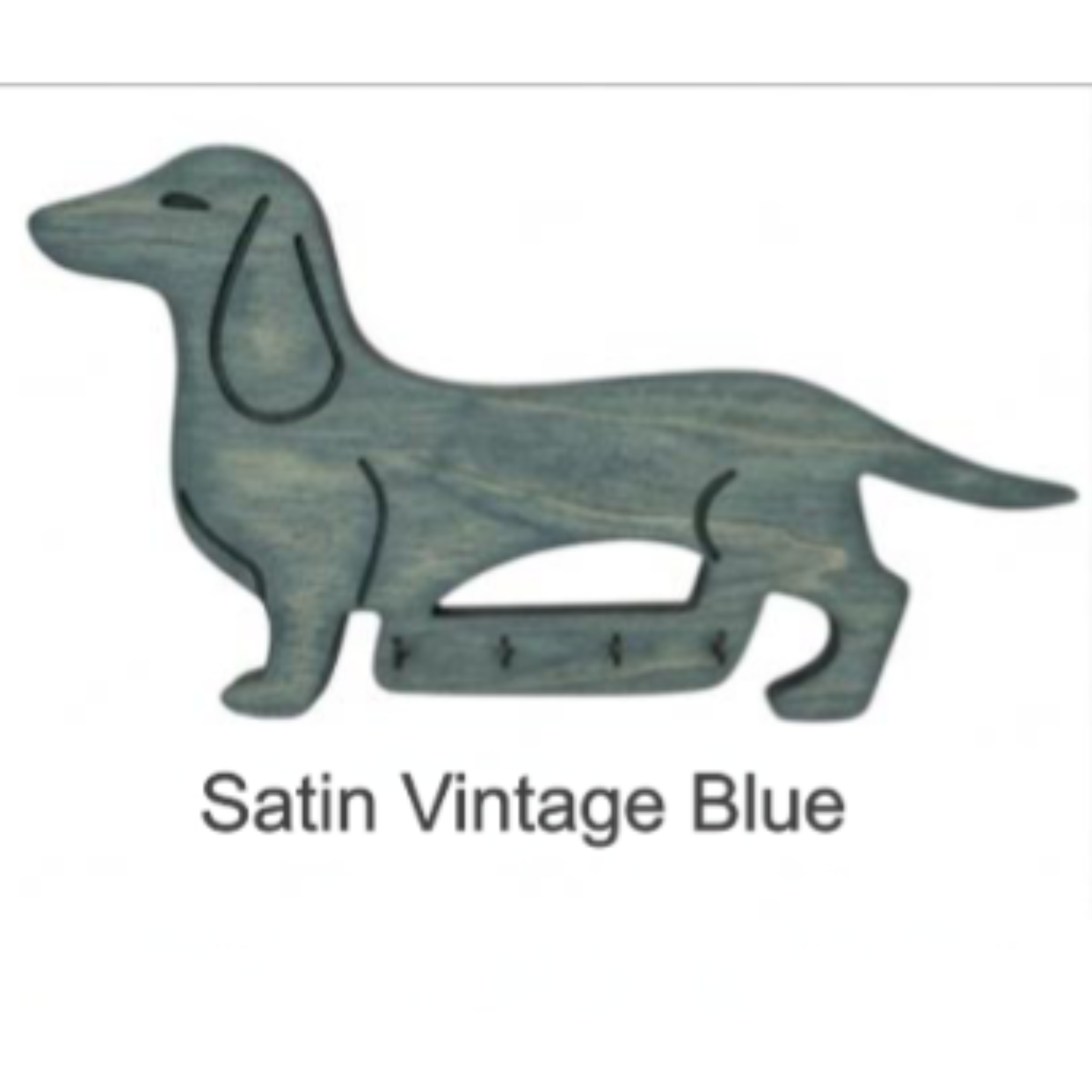 Satin vintage blue dog-shaped key holder on a white background