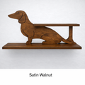 Wooden shelf shaped like a dachshund on a white background